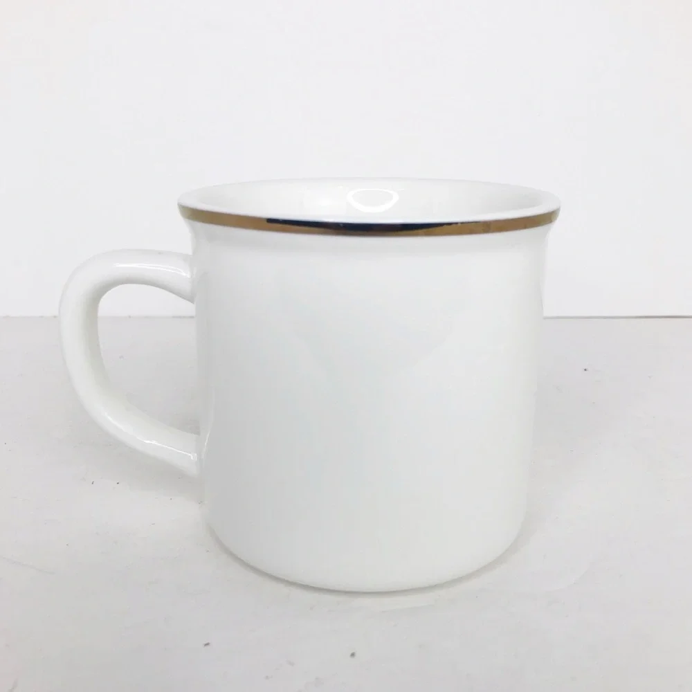 Pottery barn, gold toned, rimmed plaid S coffee mug
